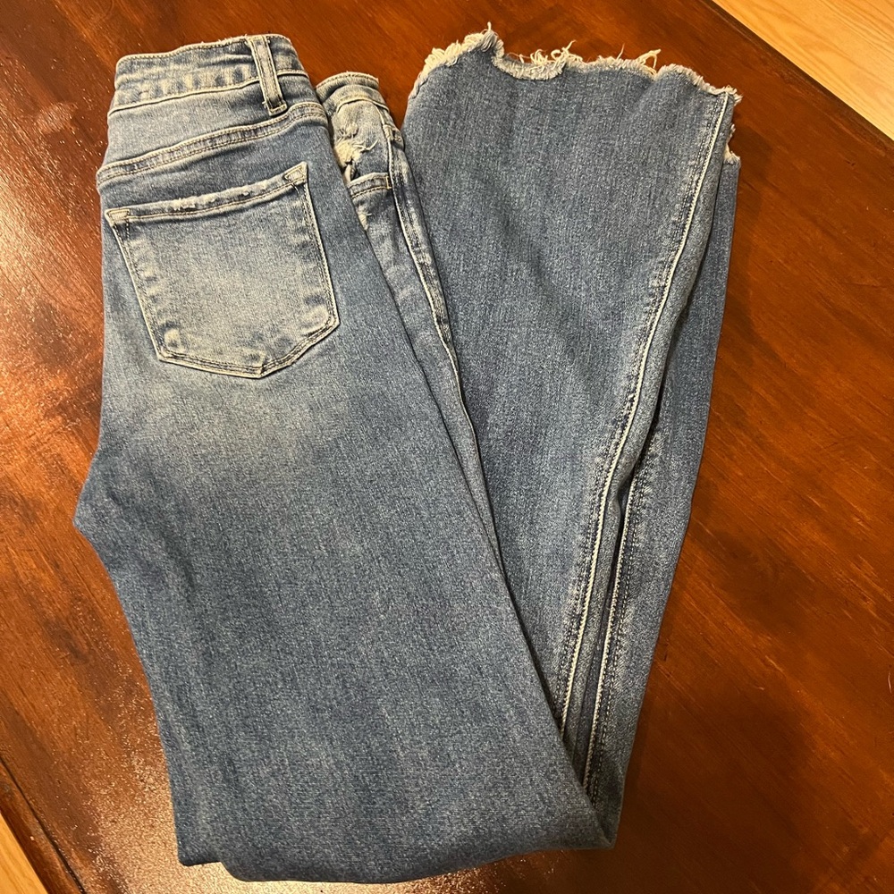 Women's Light Blue Distressed Hem Jeans